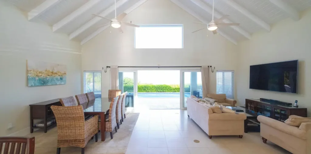 Panoramic pool and Chalk Sound views from living and dining room
