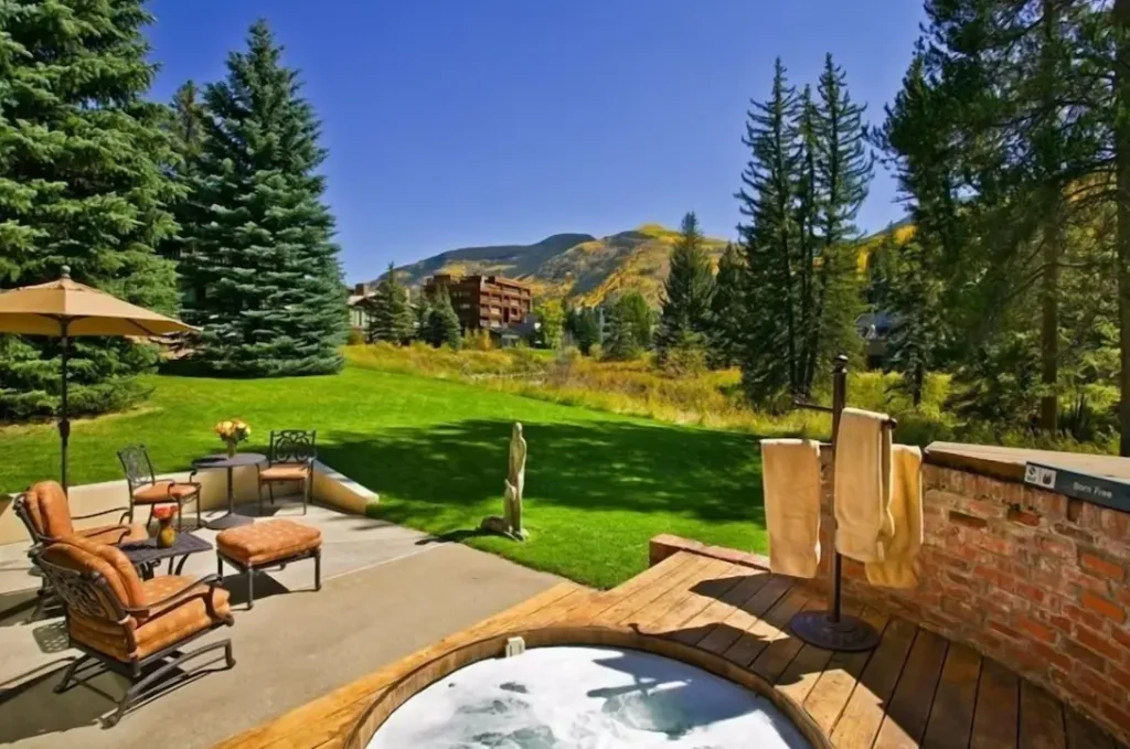 Outdoor hot tub with terrace/patio