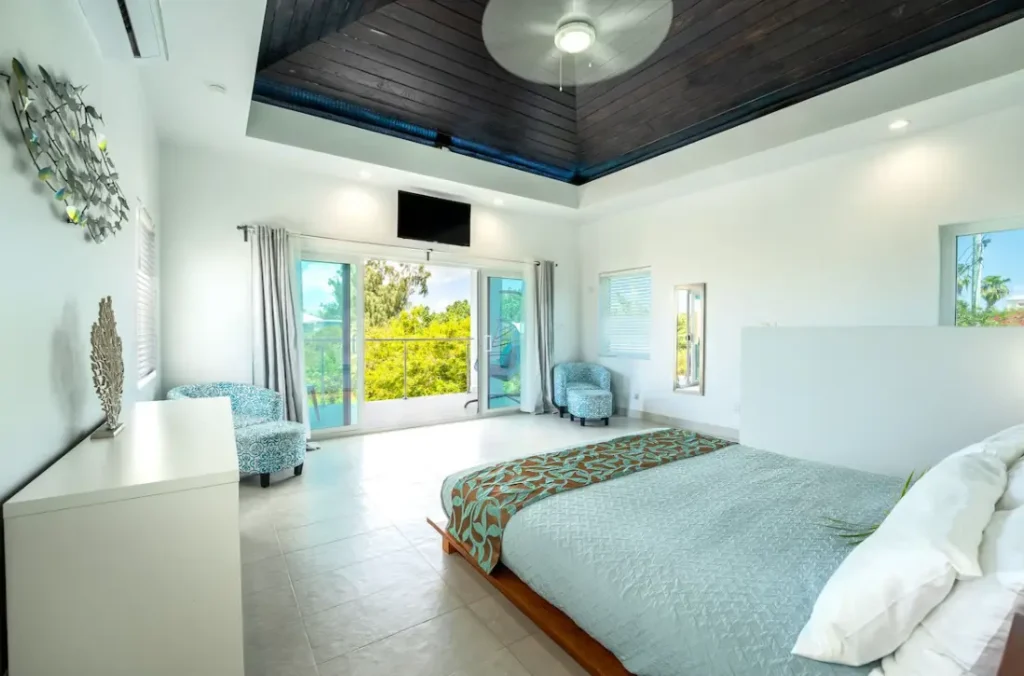 Full king platform bed with balcony view