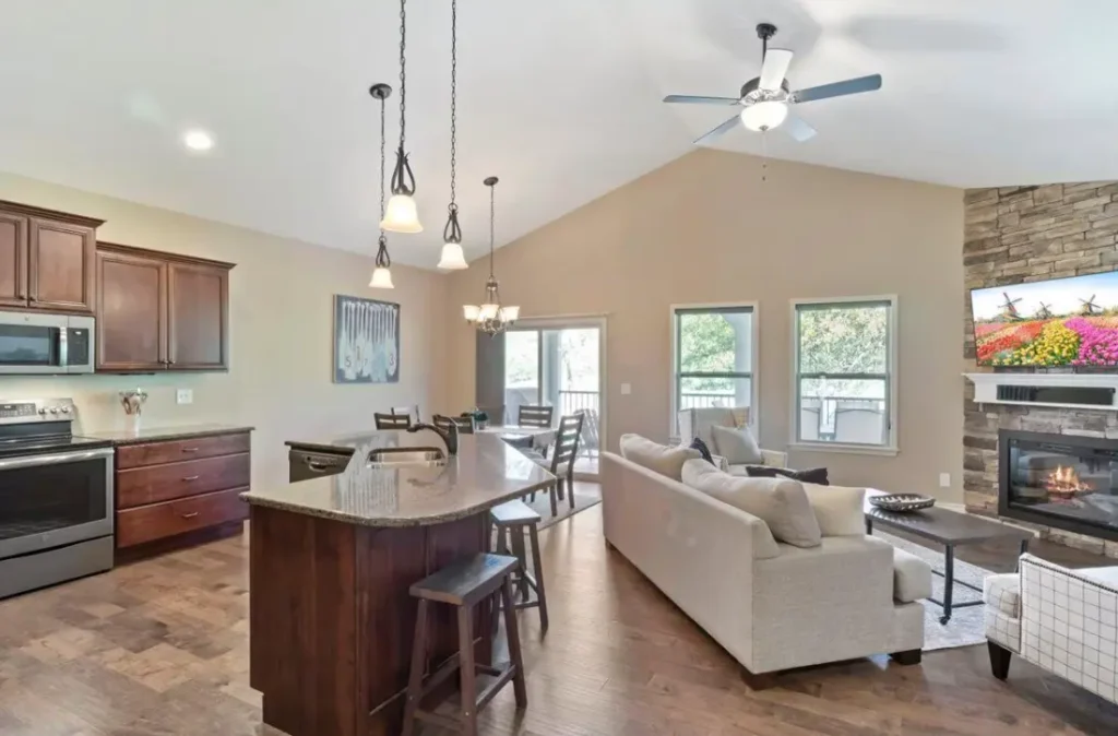 Vaulted Great Room opens to kitchen and upper deck