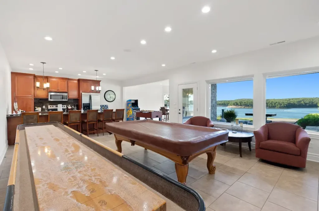 lower level game room, kitchen and dining area