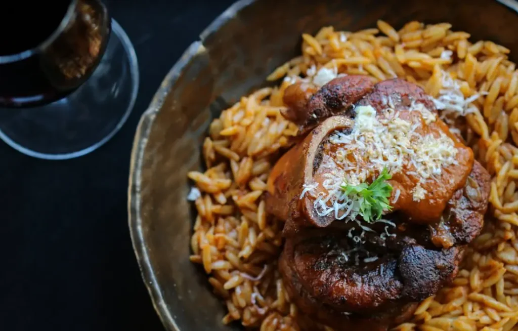 Giouvetsi / lamb osso buco, orzo, tomato sauce, grated mizithra