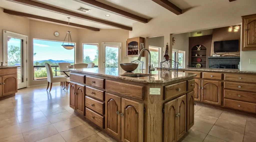 Kitchen with large island and room for the whole family to gather.