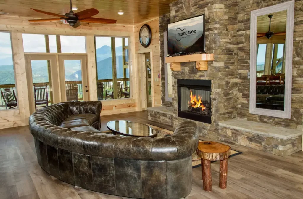 Living Area on the Main Level with TV and Fireplace