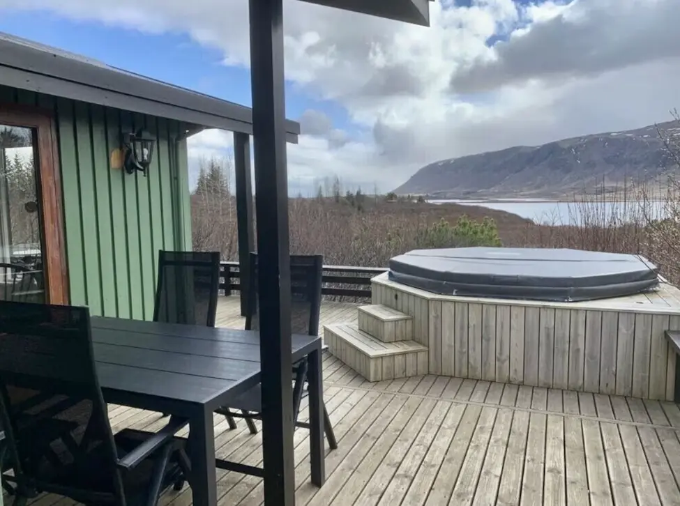 Outdoor dining and hot tub with great view