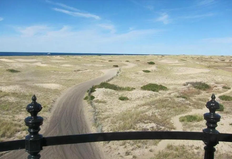 View from the top of the lighthouse looking over the dunes