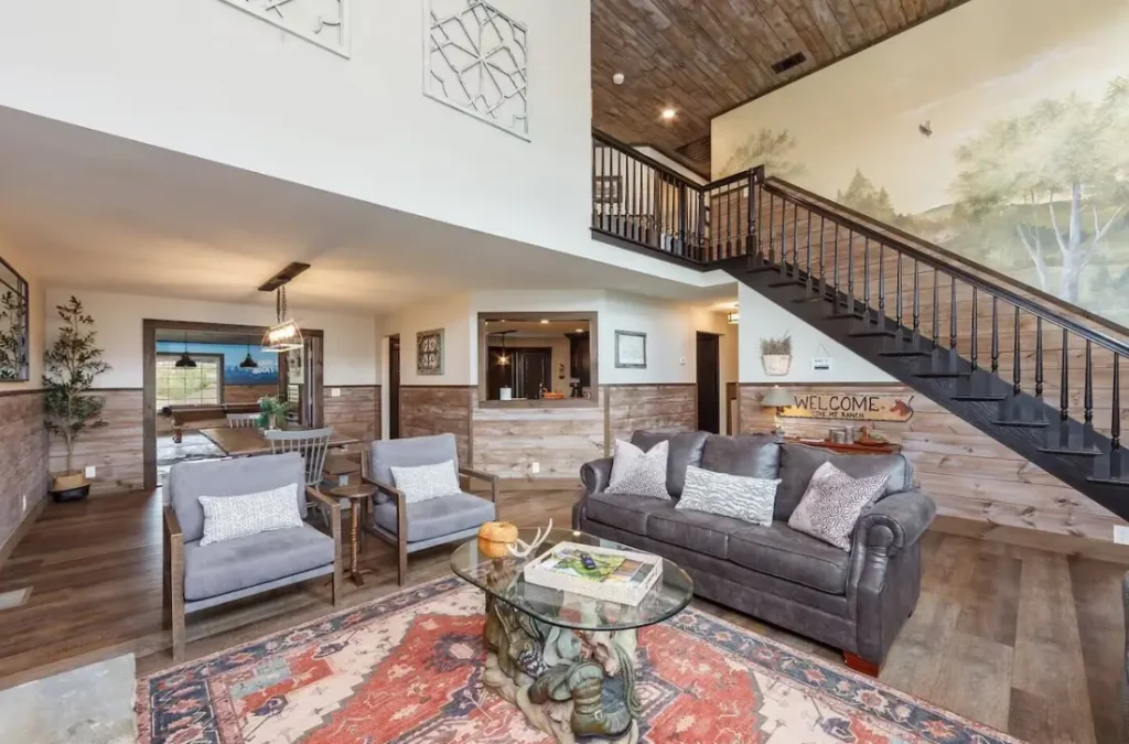 Beautiful living space with staircase up to the second floor