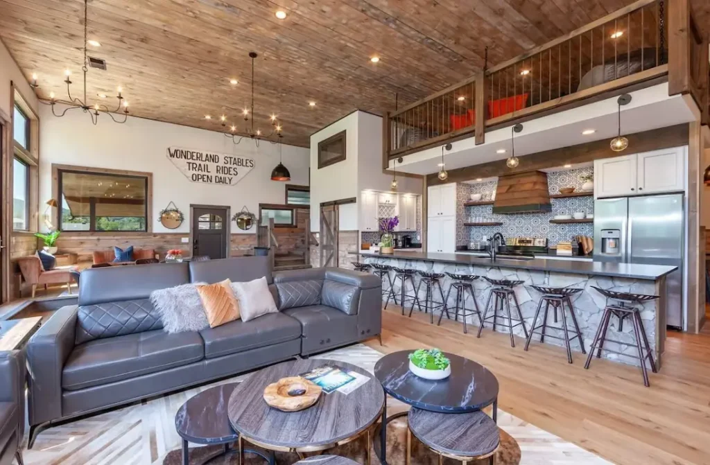 Stylishly designed open concept living room and kitchen