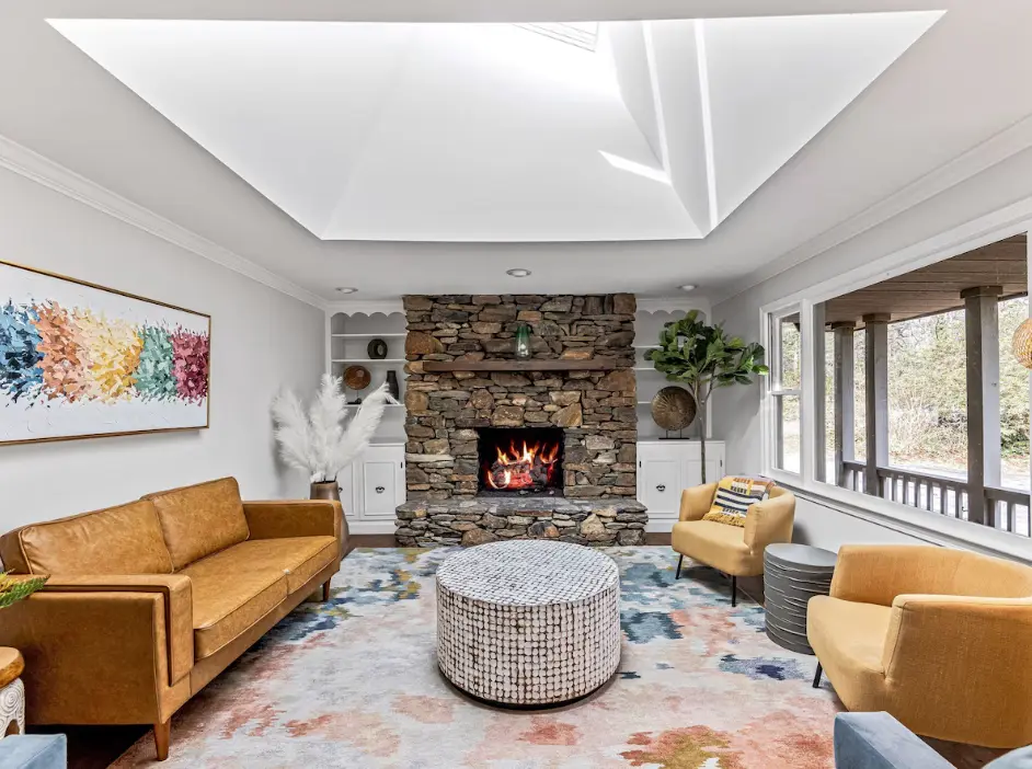 Stunning living room filled with natural light by skylight