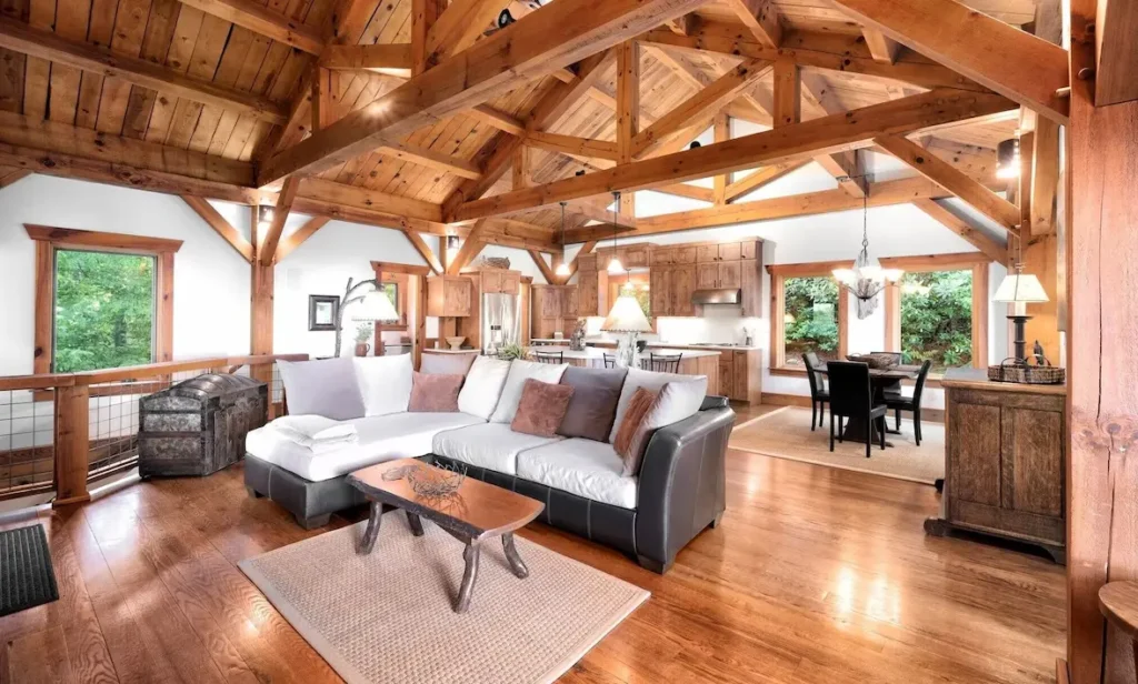 Living room with queen sleeper/sofa Also showing dining room & kitchen