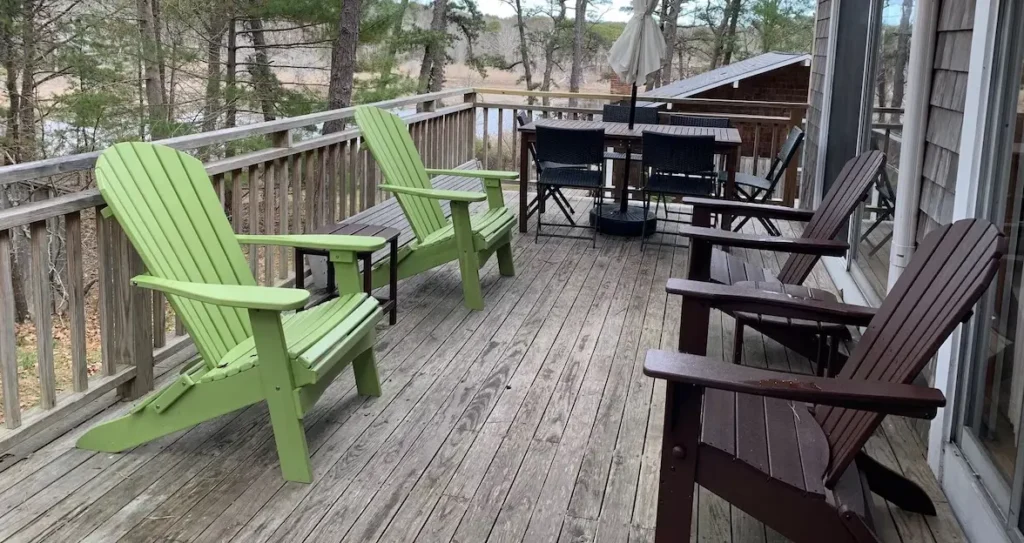 Another view of the deck showing the Polywood adirondack chairs