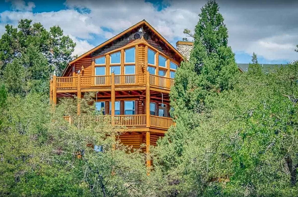large Big Bear cabin rental among green trees