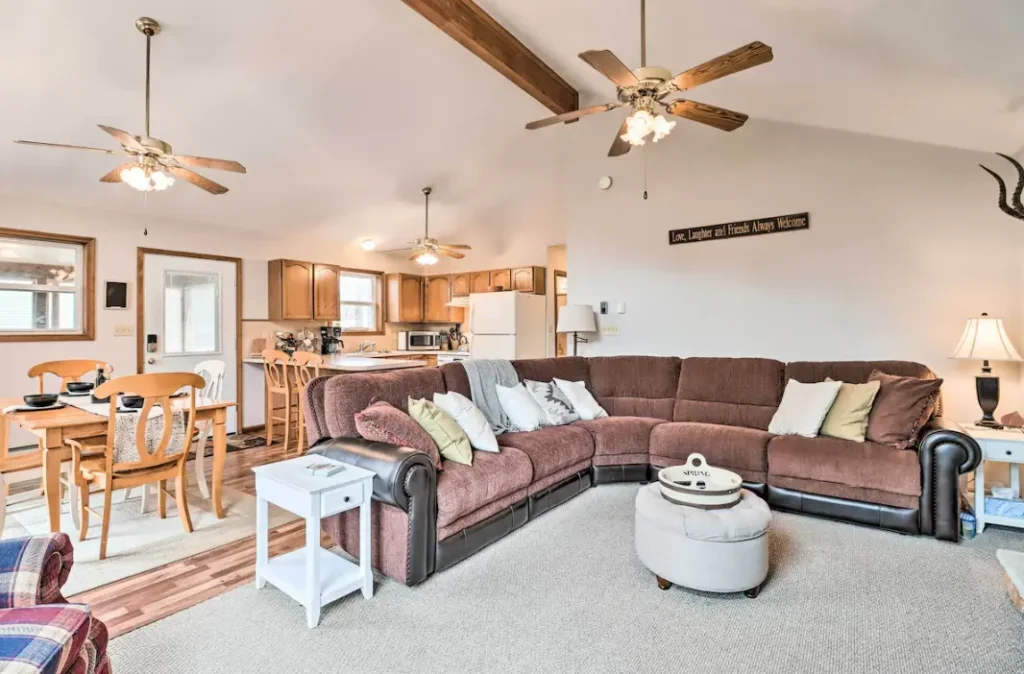 Interior design of the cabin including living area, dining and kitchen