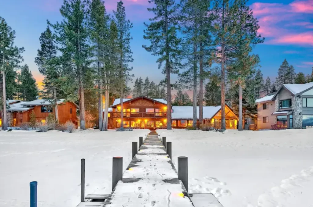 Lakefront Level grounds with lawn and stately Sierra trees