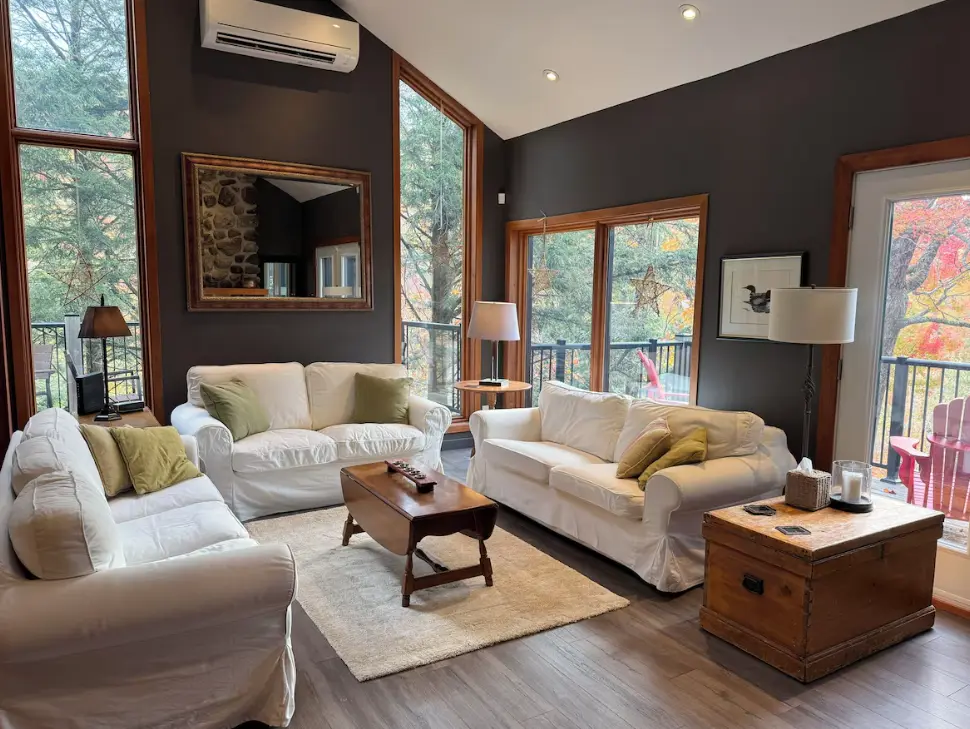 Sun-filled living room with panoramic views of the mountain