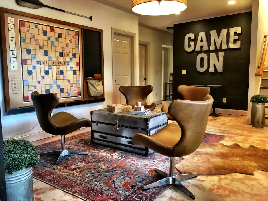 Newly added terrace game room with Roku tv, electronic fireplace, and game console