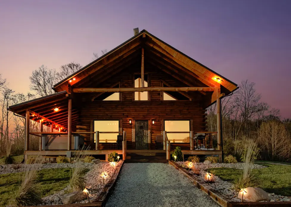 The cabin's large porch overhangs make it a relaxing spot no matter the season