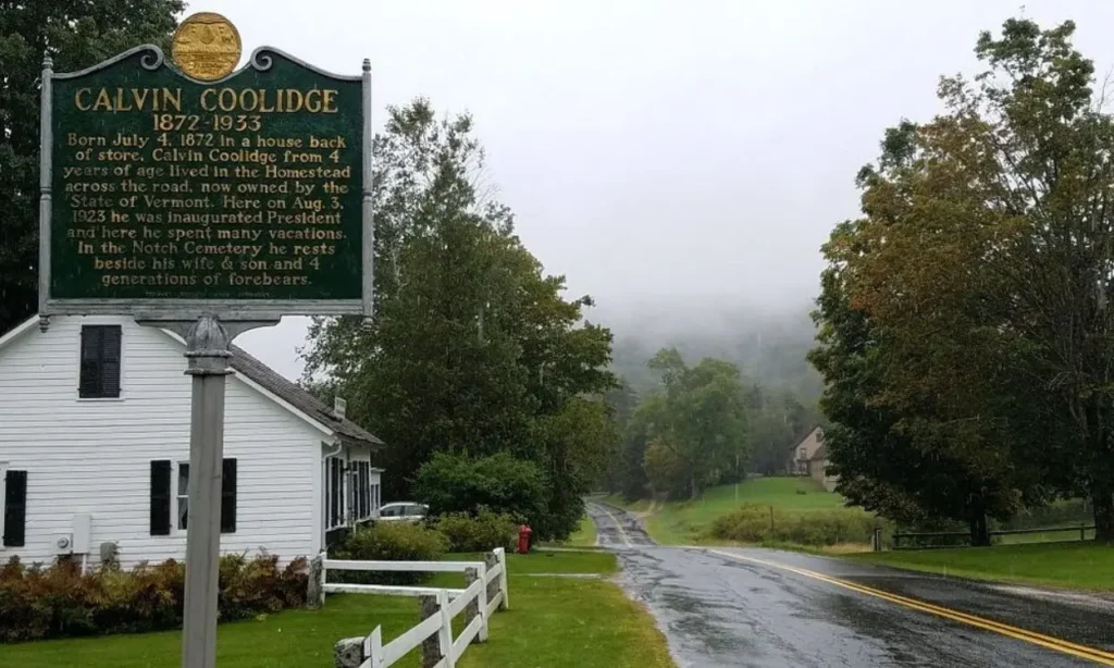 Historic marker and road at the President Calvin Coolidge State Historic Site.