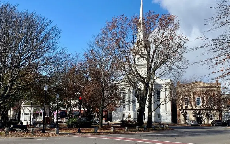 Central Square features historic buildings and leafless trees in a small-town setting.