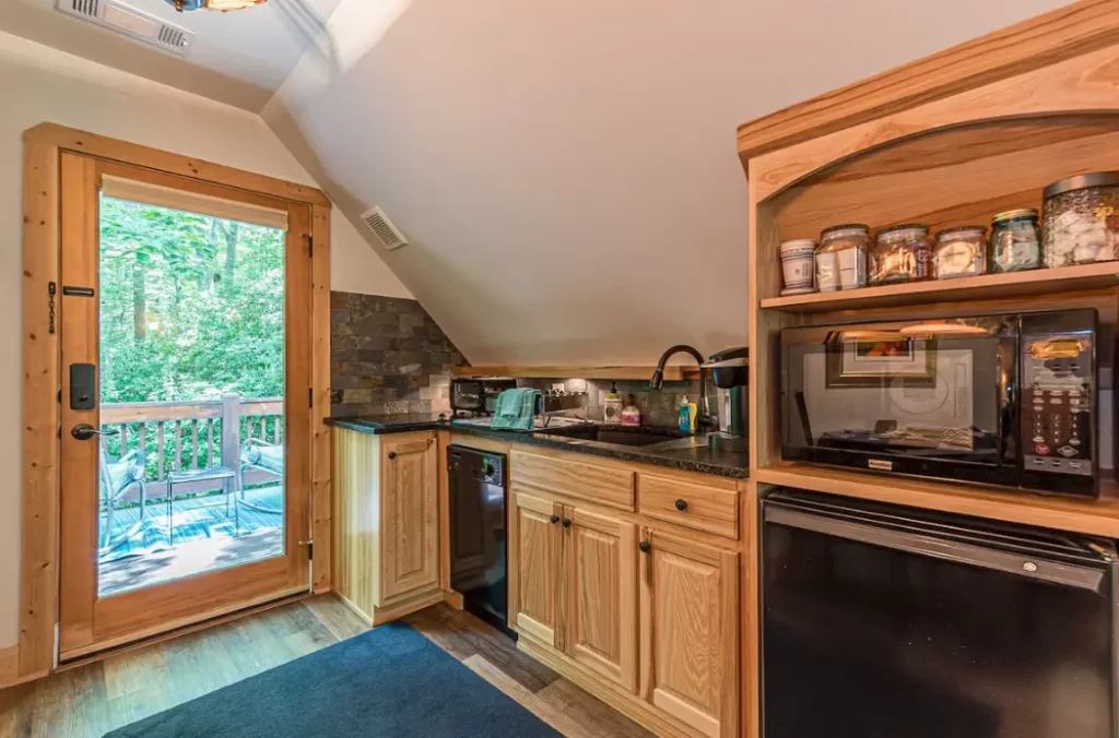 Kitchenette includes a dishwasher & two burner stovetop