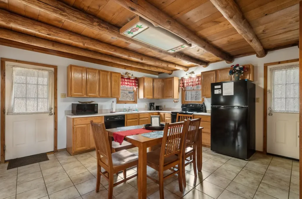 Large kitchen includes full size fridge, electric range, dishwasher & microwave