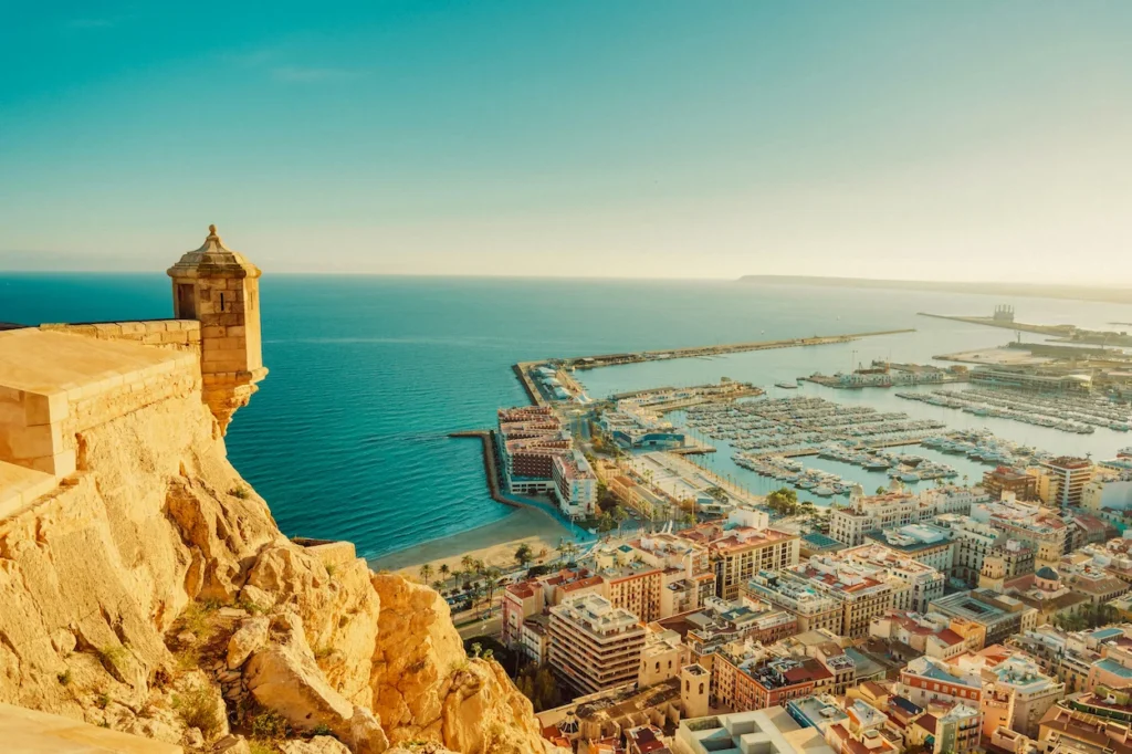 The stone lookout tower of Santa Bárbara Castle overlooking the city and port of Alicante