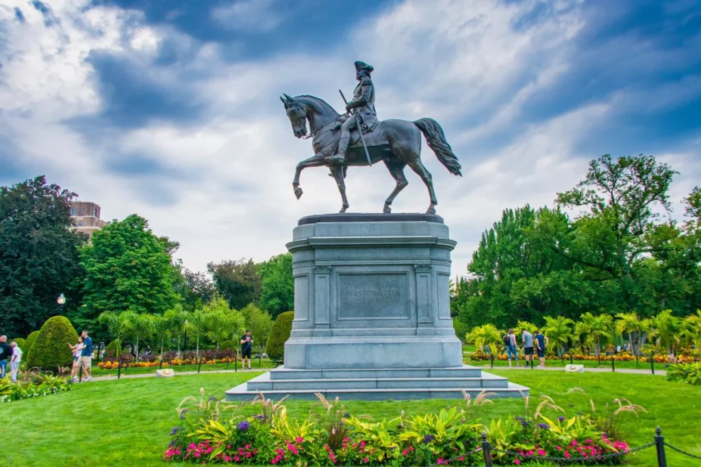 The equestrian bronze statue of George Washington on a granite pedestal in the Boston Public Garden