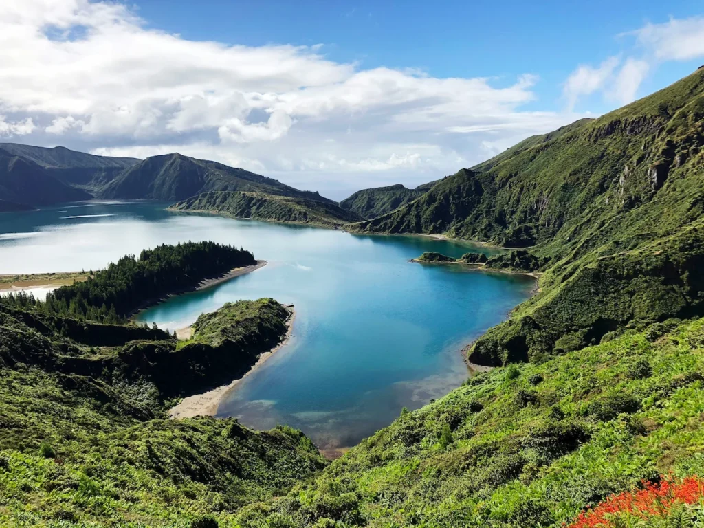 Lagoa do Fogo crater lake surrounded by green volcanic hills in São Miguel, Azores