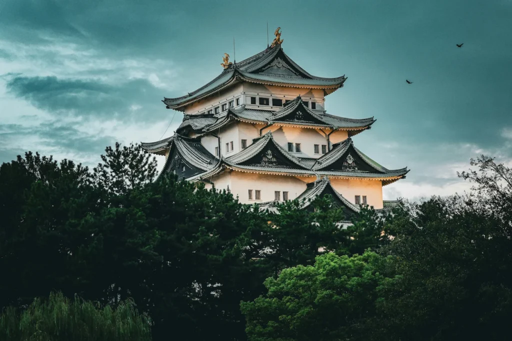 Nagoya Castle main keep behind green trees