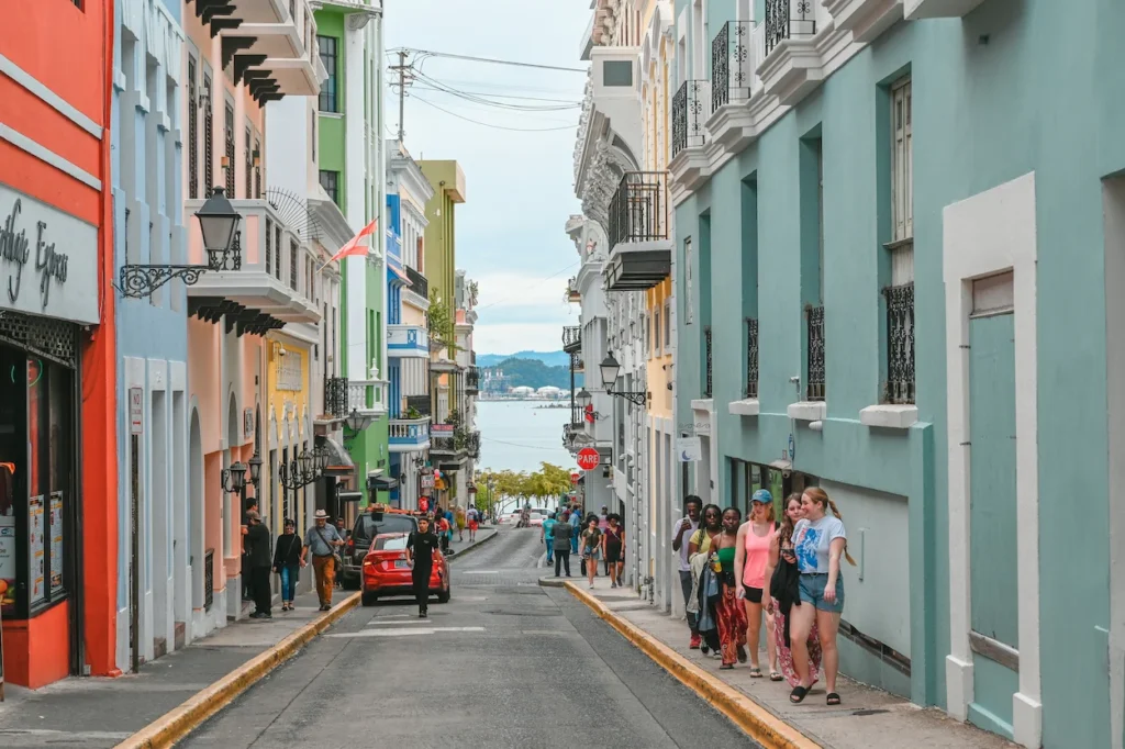 Colorful historic buildings lining a cobblestone street in Old San Juan