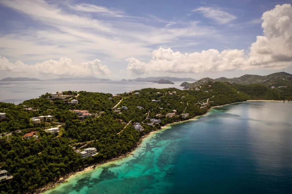 Aerial view of hillside villas on the lush Peterborg Peninsula overlooking Magens Bay in St. Thomas
