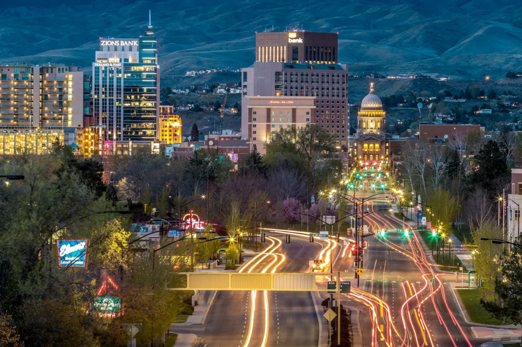 Boise skyline and Idaho State Capitol at dusk with light trails