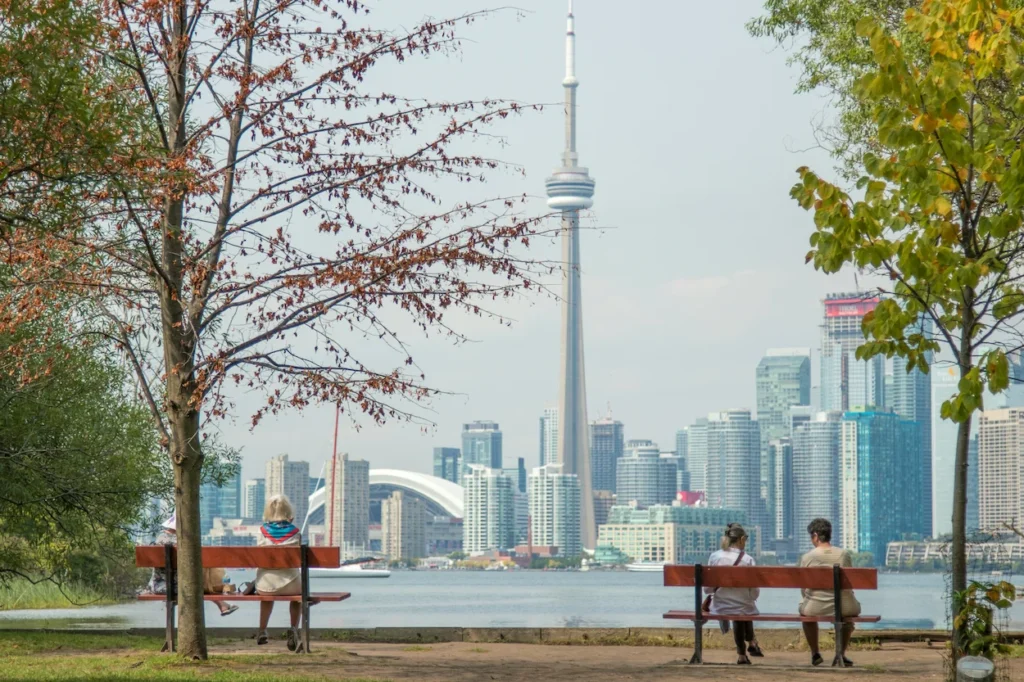 Toronto skyline and CN Tower viewed across the water from the Toronto Islands park