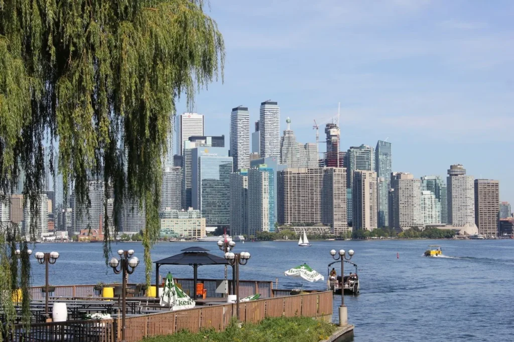 Toronto city skyline viewed across the harbor from a patio on the Toronto Islands