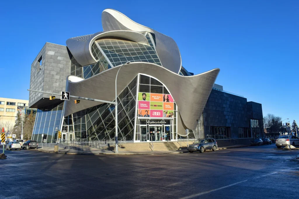 Art Gallery of Alberta building featuring wrapping silver metal waves and large glass windows