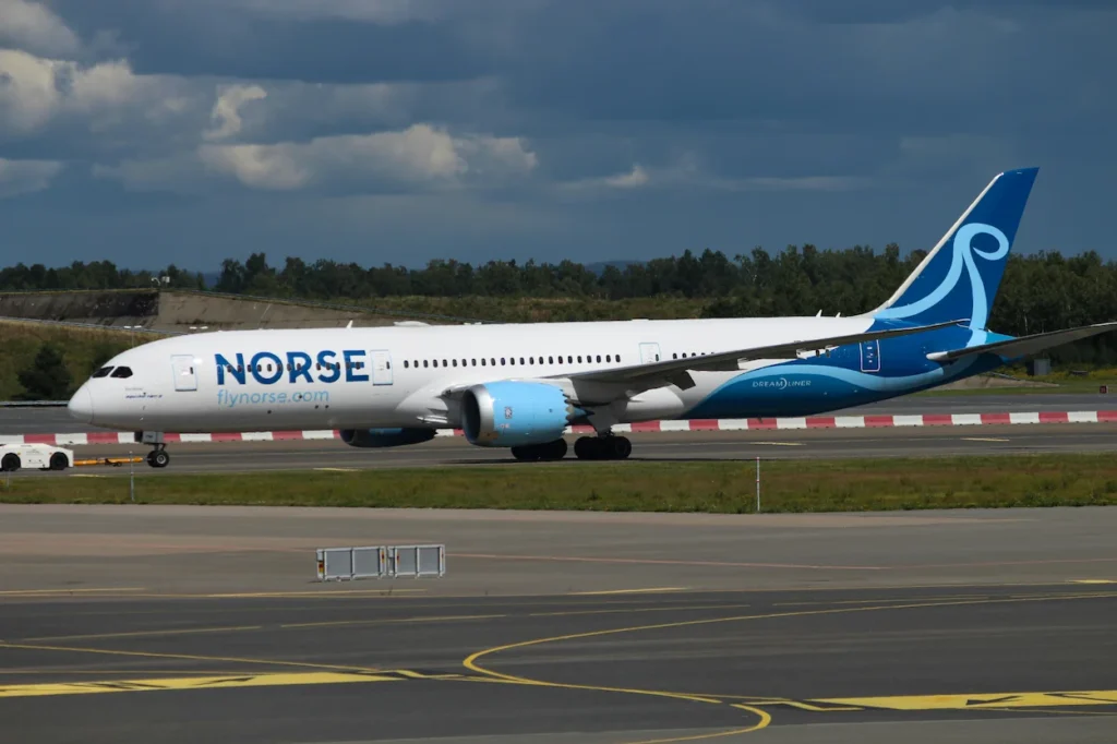 A Norse Atlantic Airways Boeing 787 Dreamliner passenger airplane flying in the sky