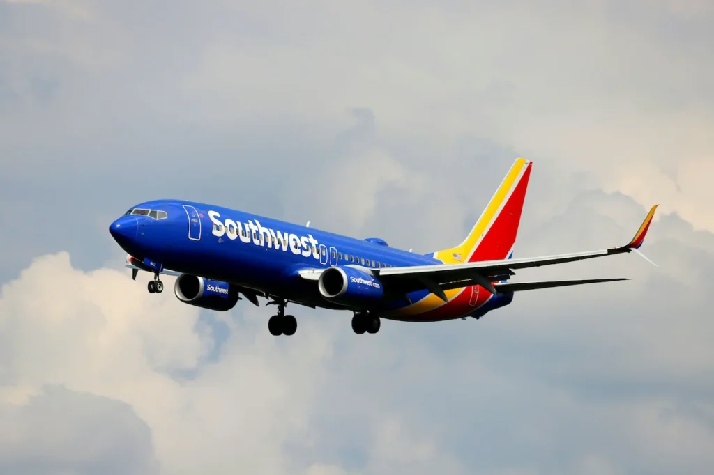 Southwest Airlines Boeing 737 passenger airplane flying in the sky