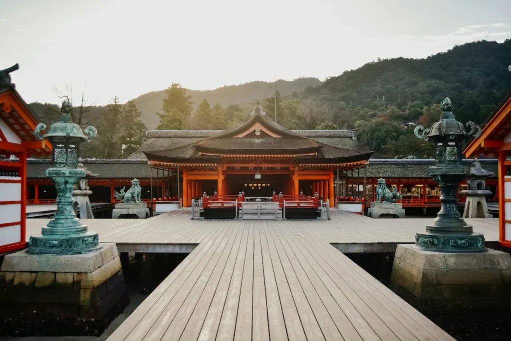 Wooden boardwalk leading to the main pavilion of Itsukushima Shrine on Miyajima Island