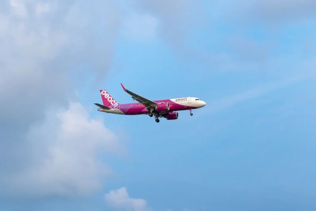 Peach Aviation Airbus A320 commercial passenger jet descending for landing