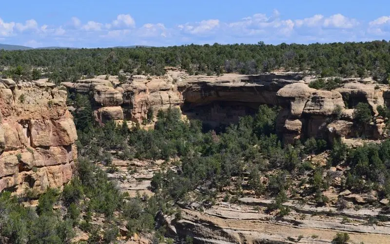 Cliff dwellings built into rock formations at Mesa Verde in the USA.