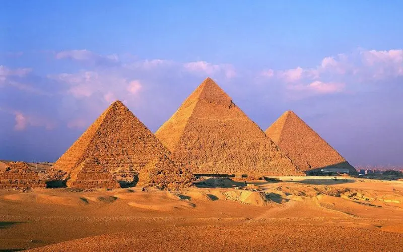 The Pyramids at Giza rising from the desert in Egypt.