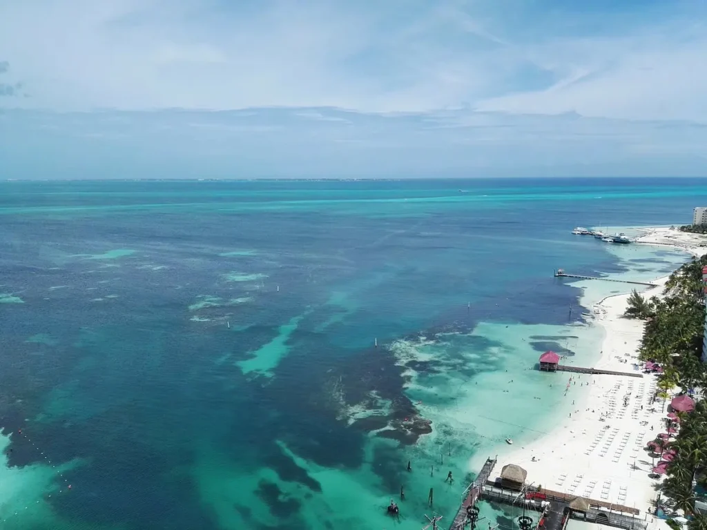 A view of turquoise waters and white sand beaches in Cancun.