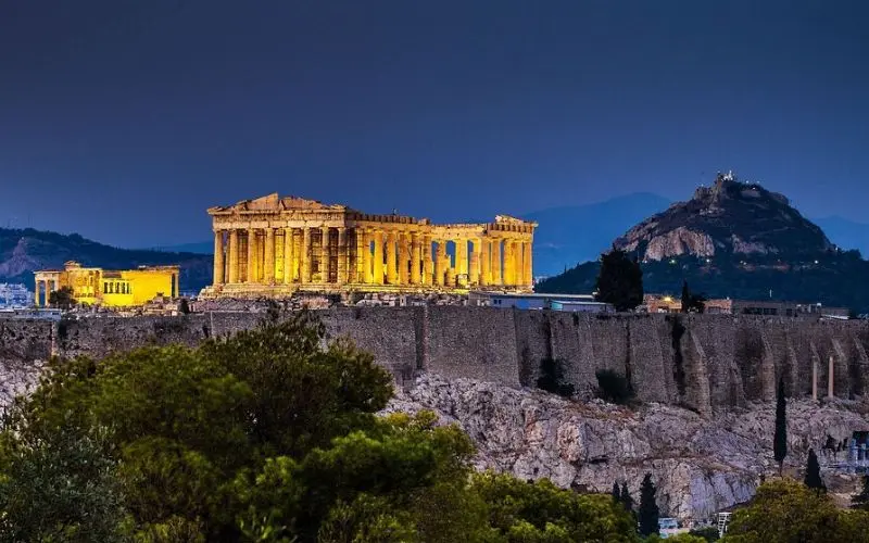 The Parthenon lit up at night in Athens, Greece.