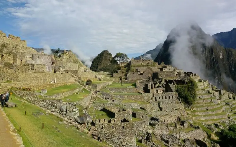 Ancient stone terraces and ruins of Machu Picchu in Peru.