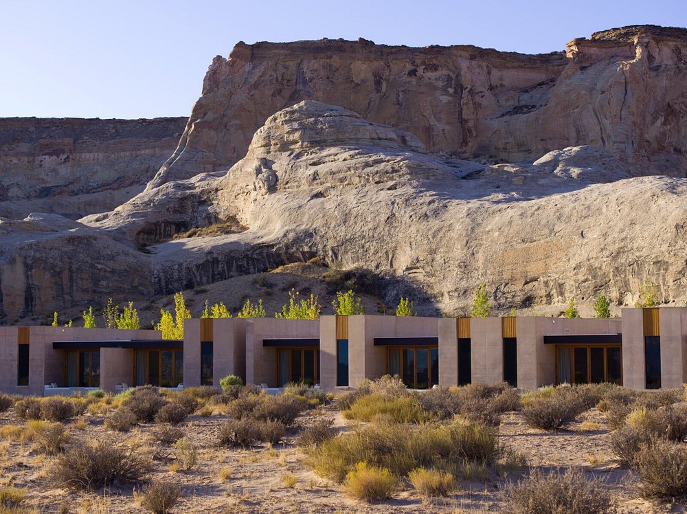 Amangiri resort suites built into desert cliffs with modern design and natural surroundings.
