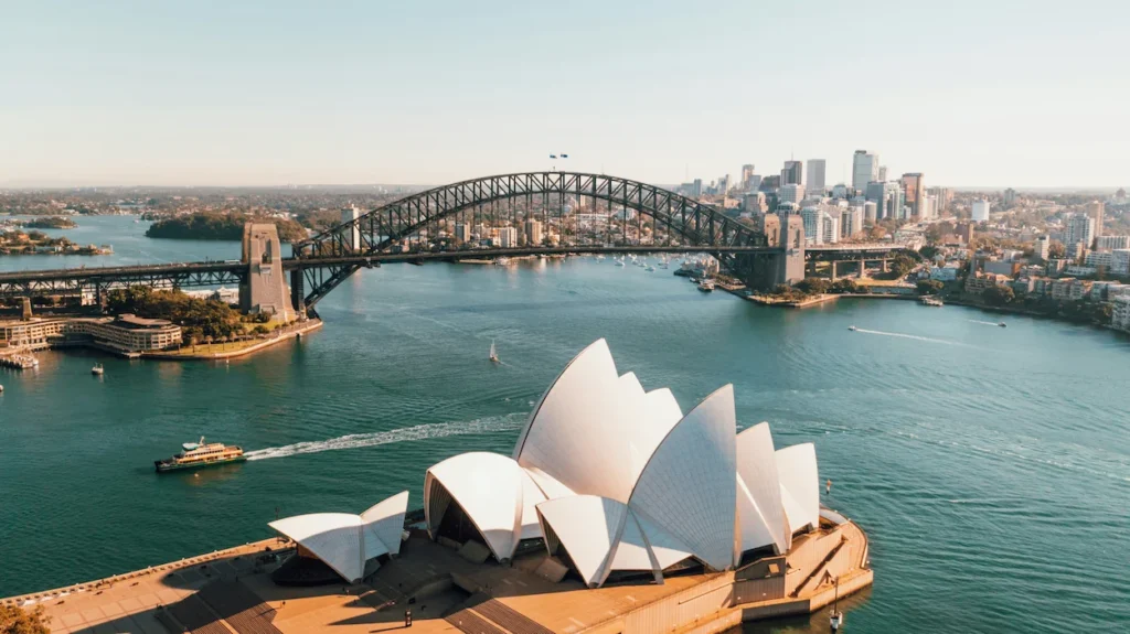 Aerial view of the Sydney Opera House and Sydney Harbour Bridge over the water