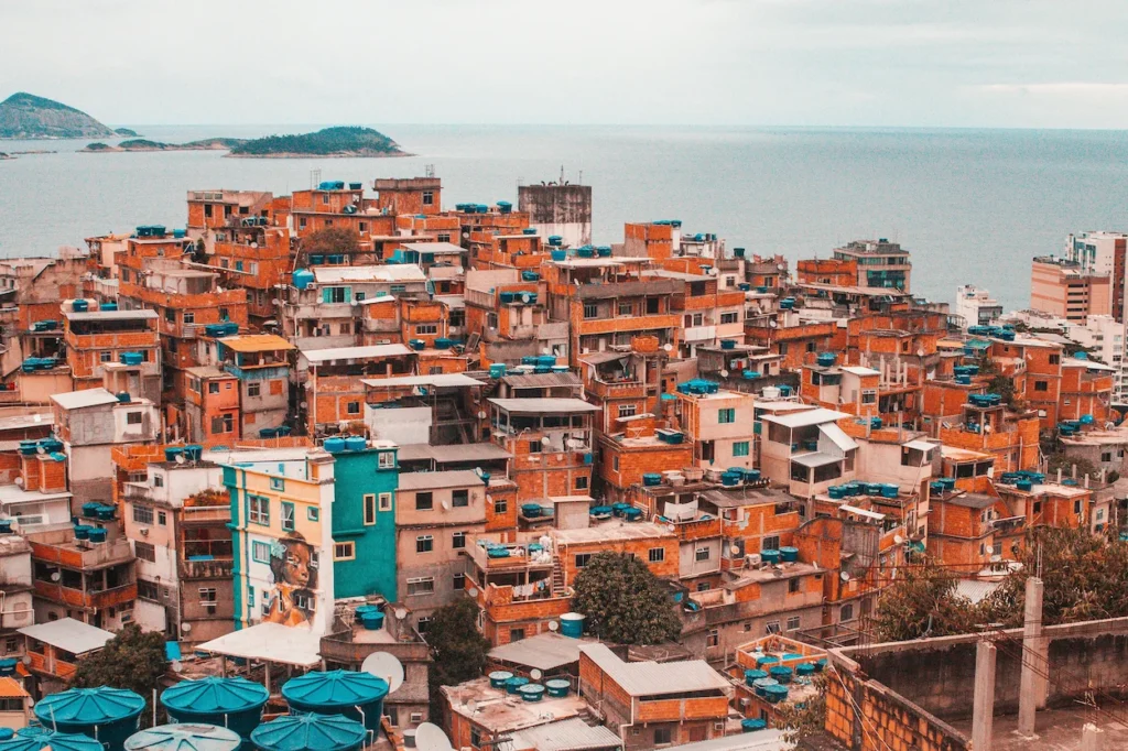 Dense brick houses of the Vidigal favela overlooking the ocean in Rio de Janeiro, Brazil