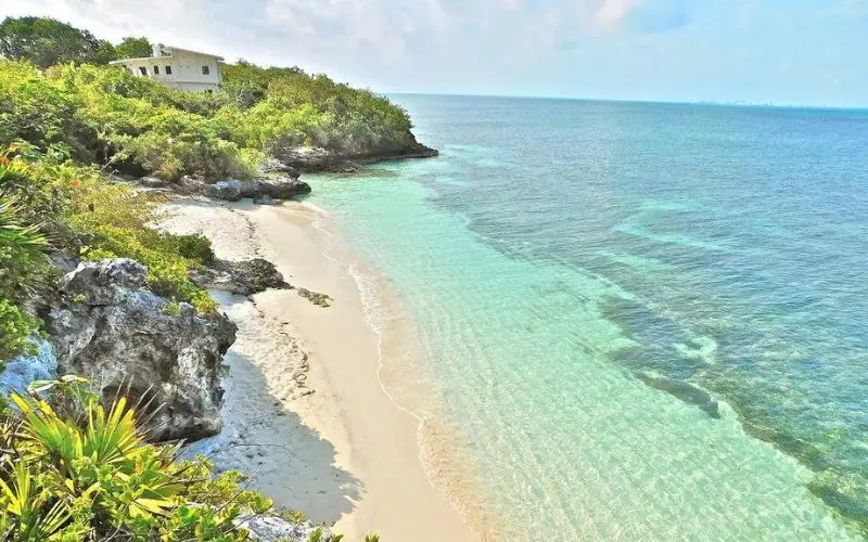 Clear shallow water lines the coast of Isla Mujeres.