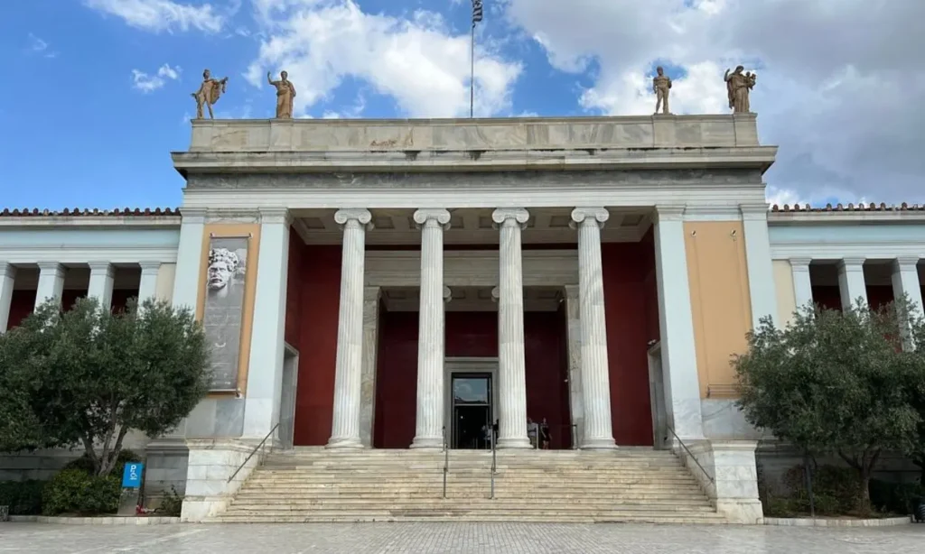 The National Archaeological Museum features tall white columns and statues on top.