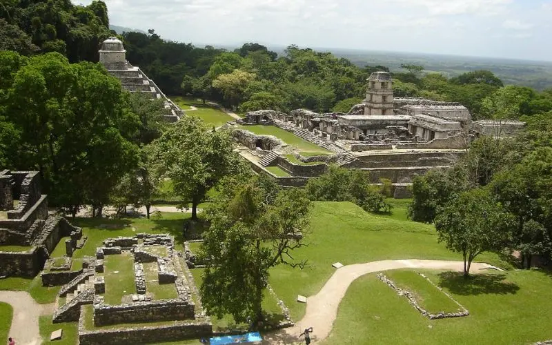 Ancient ruins sit among the jungle at Palenque.